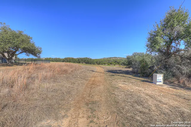 a view of lake with mountain in the background