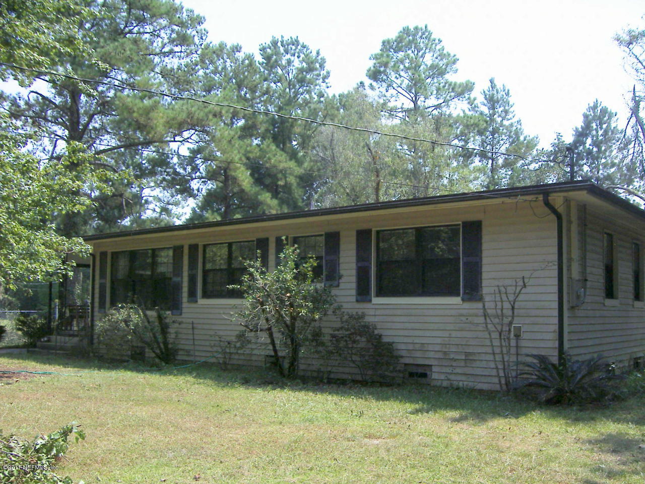 54002 Parks Road Callahan, FL 32011 - Photo 1 of 11 a view of a house with a yard