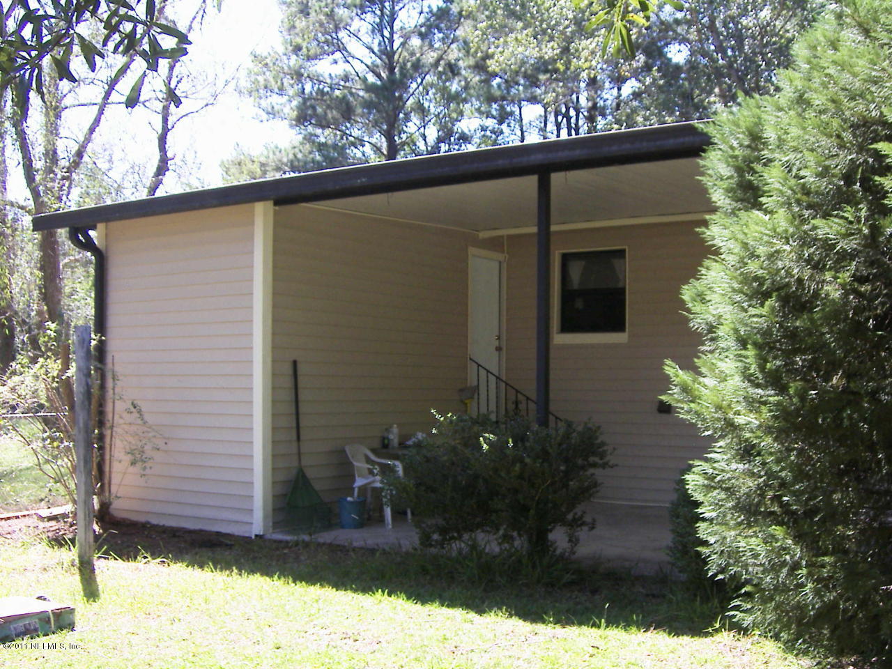 54002 Parks Road Callahan, FL 32011 - Photo 3 of 11 a view of a house with a yard