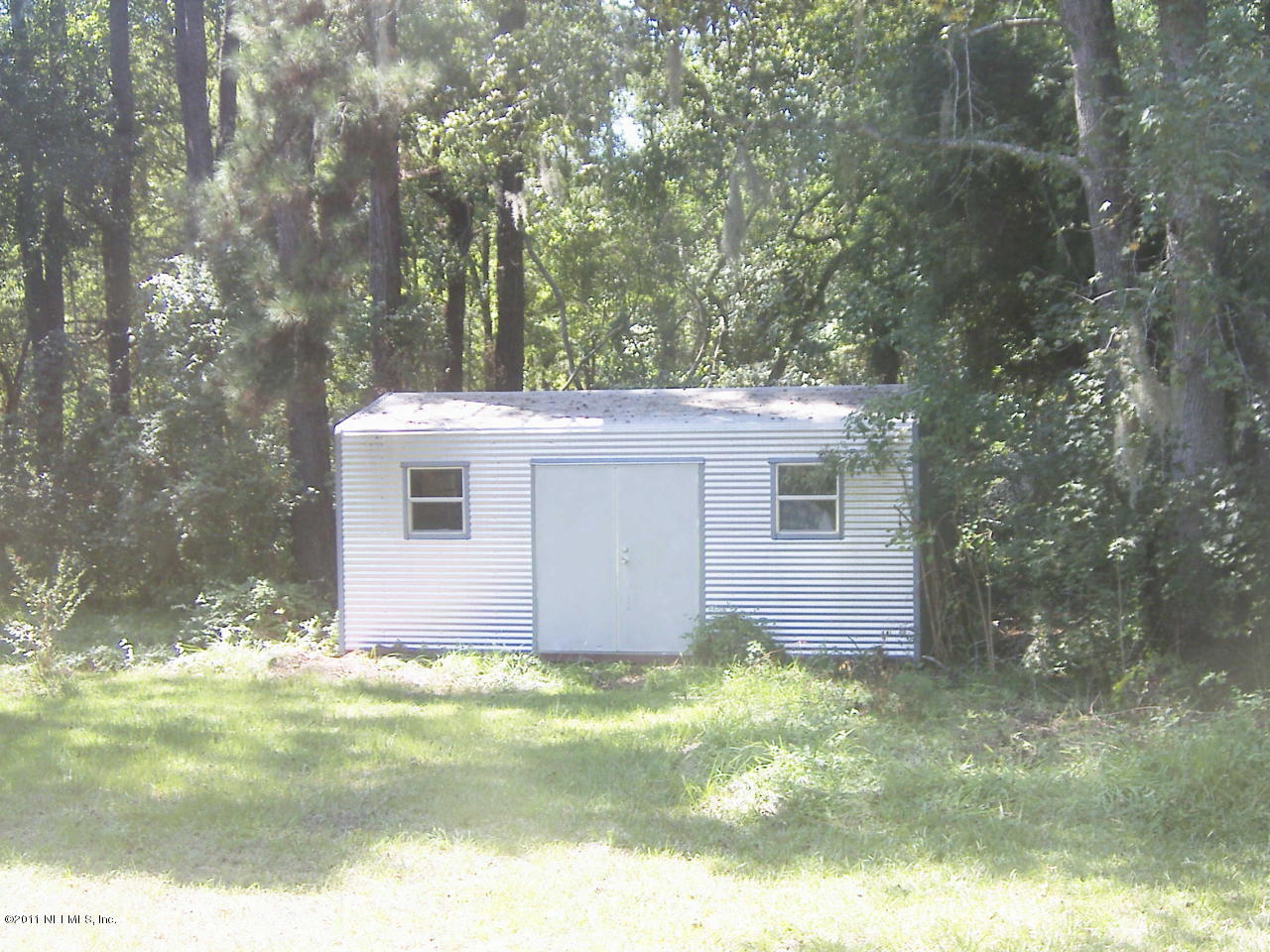54002 Parks Road Callahan, FL 32011 - Photo 4 of 11 a view of a backyard
