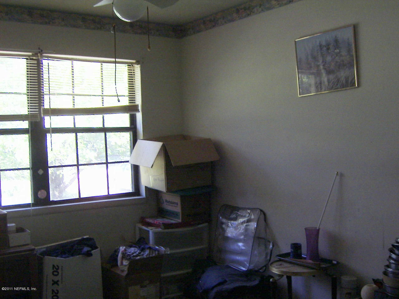 54002 Parks Road Callahan, FL 32011 - Photo 5 of 11 a living room with furniture and a window