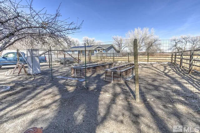 a view of a chairs and table on the terrace