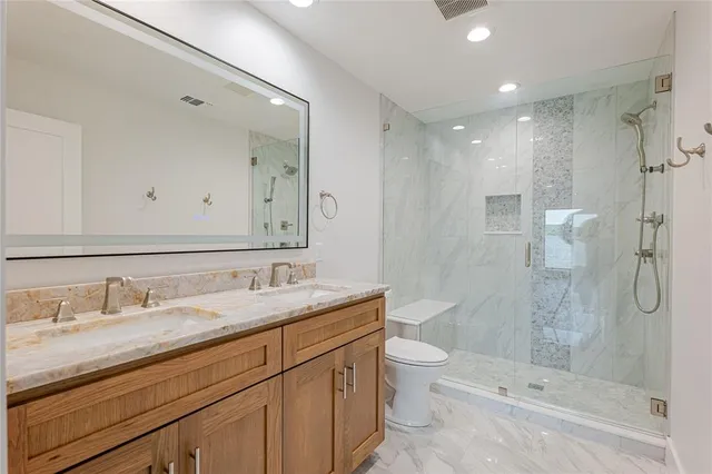 a view of a livingroom with an empty space and a fireplace
