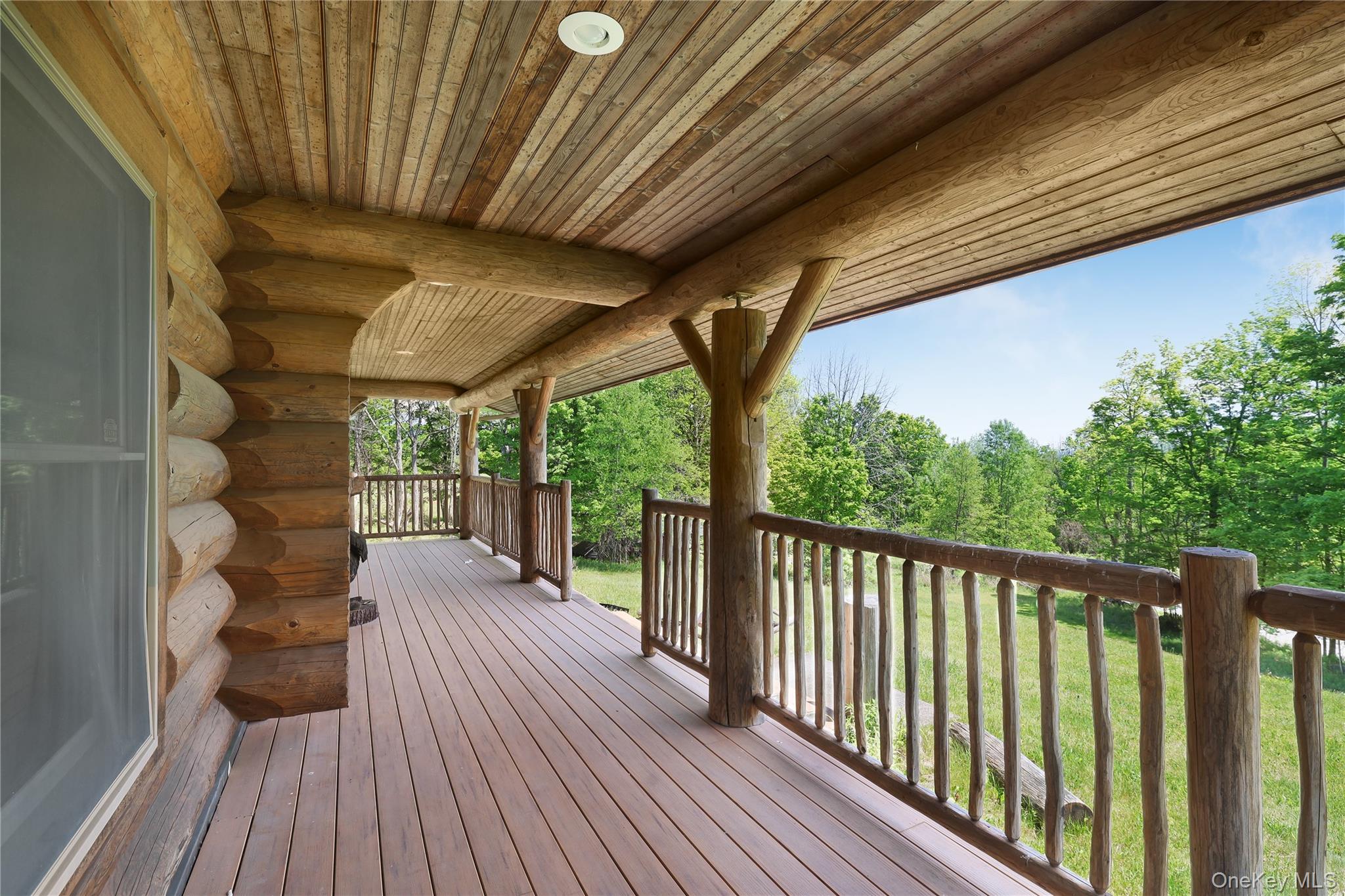 25 Cauthers Road Fallsburg, NY 12789 - Photo 5 of 27 a view of porch with wooden floor