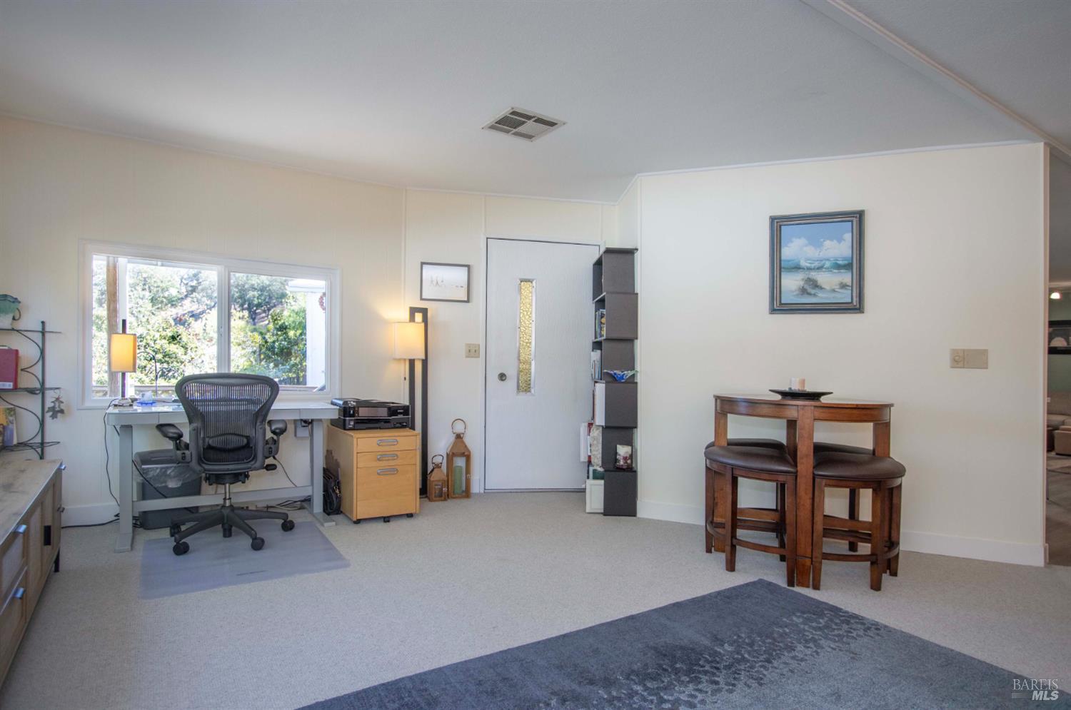 9 Fallen Leaf Way Novato, CA 94949 - Photo 11 of 32 a view of a workspace with furniture and a window