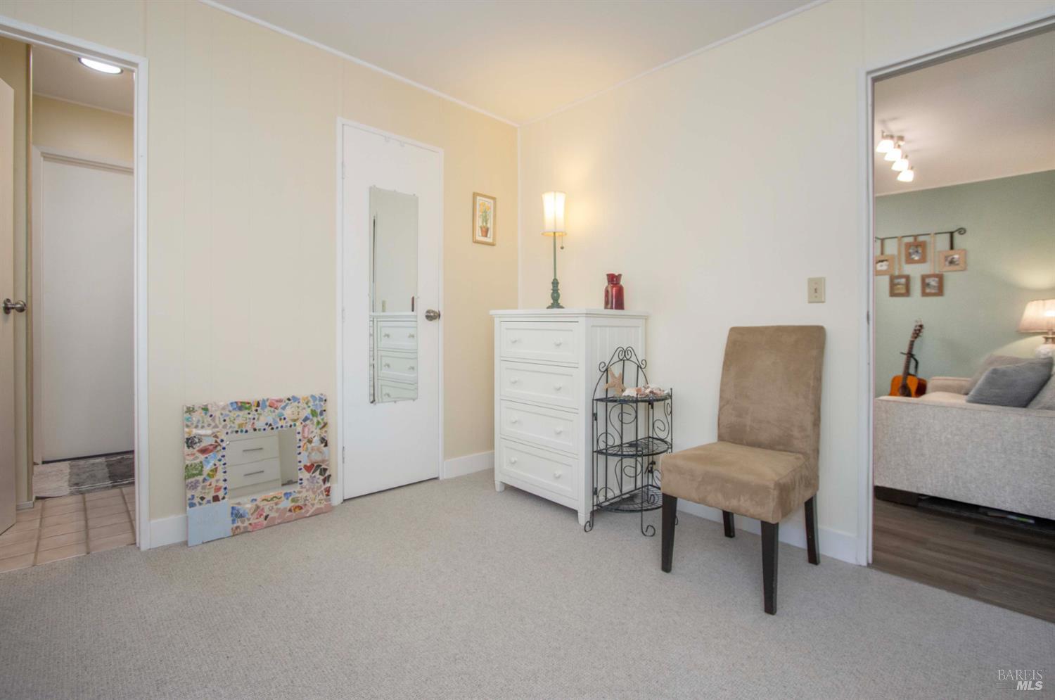9 Fallen Leaf Way Novato, CA 94949 - Photo 13 of 32 a living room with furniture and a baby crib