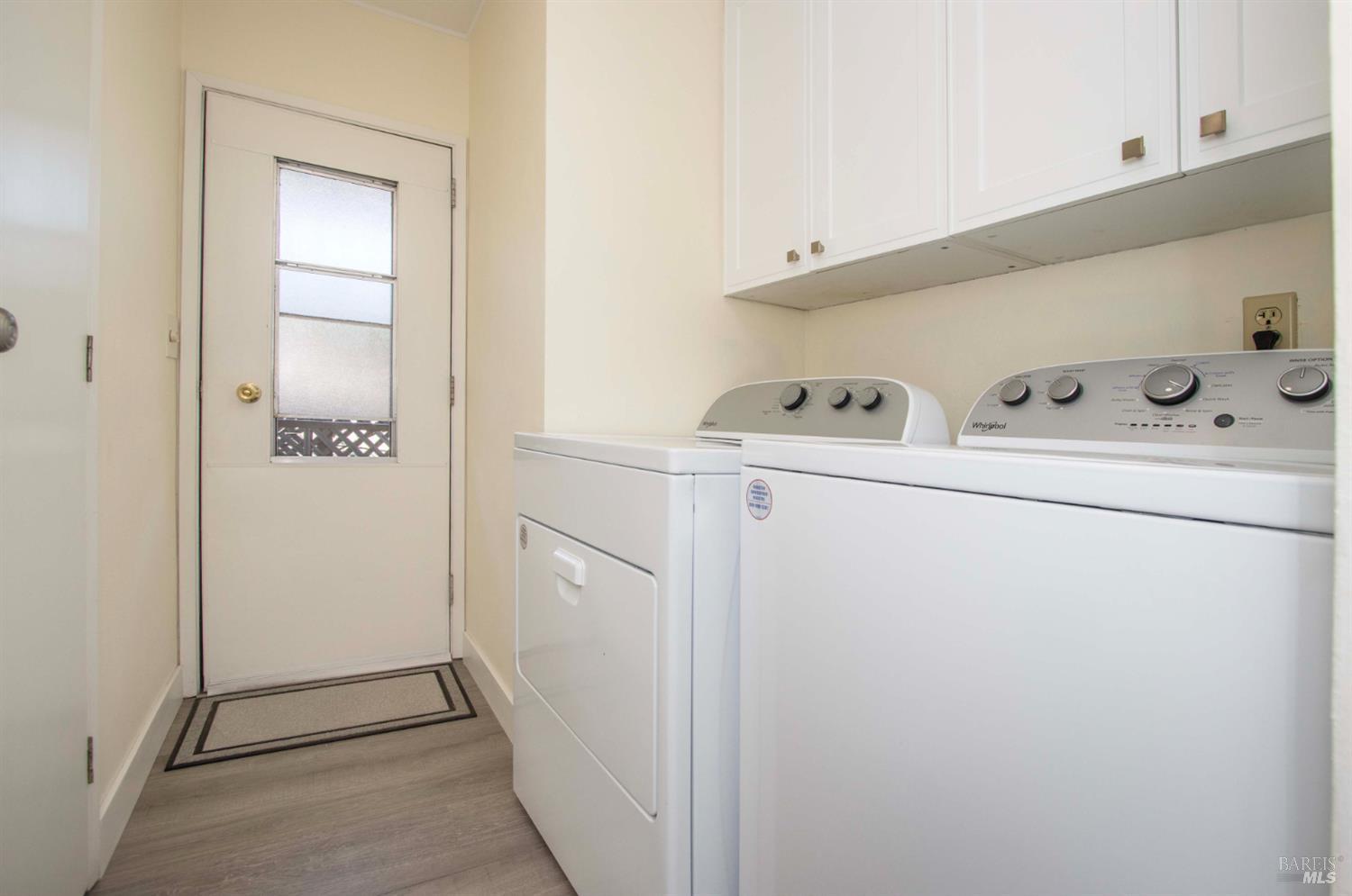 9 Fallen Leaf Way Novato, CA 94949 - Photo 22 of 32 a utility room with dryer and washer