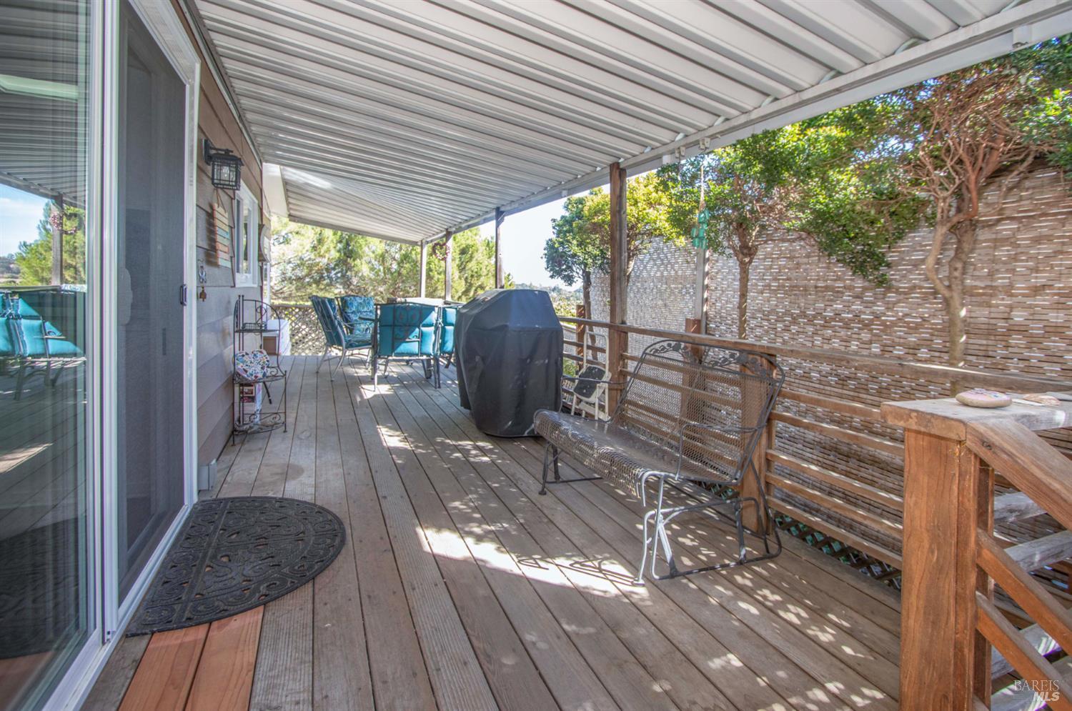 9 Fallen Leaf Way Novato, CA 94949 - Photo 28 of 32 a view of a porch with furniture and wooden floor