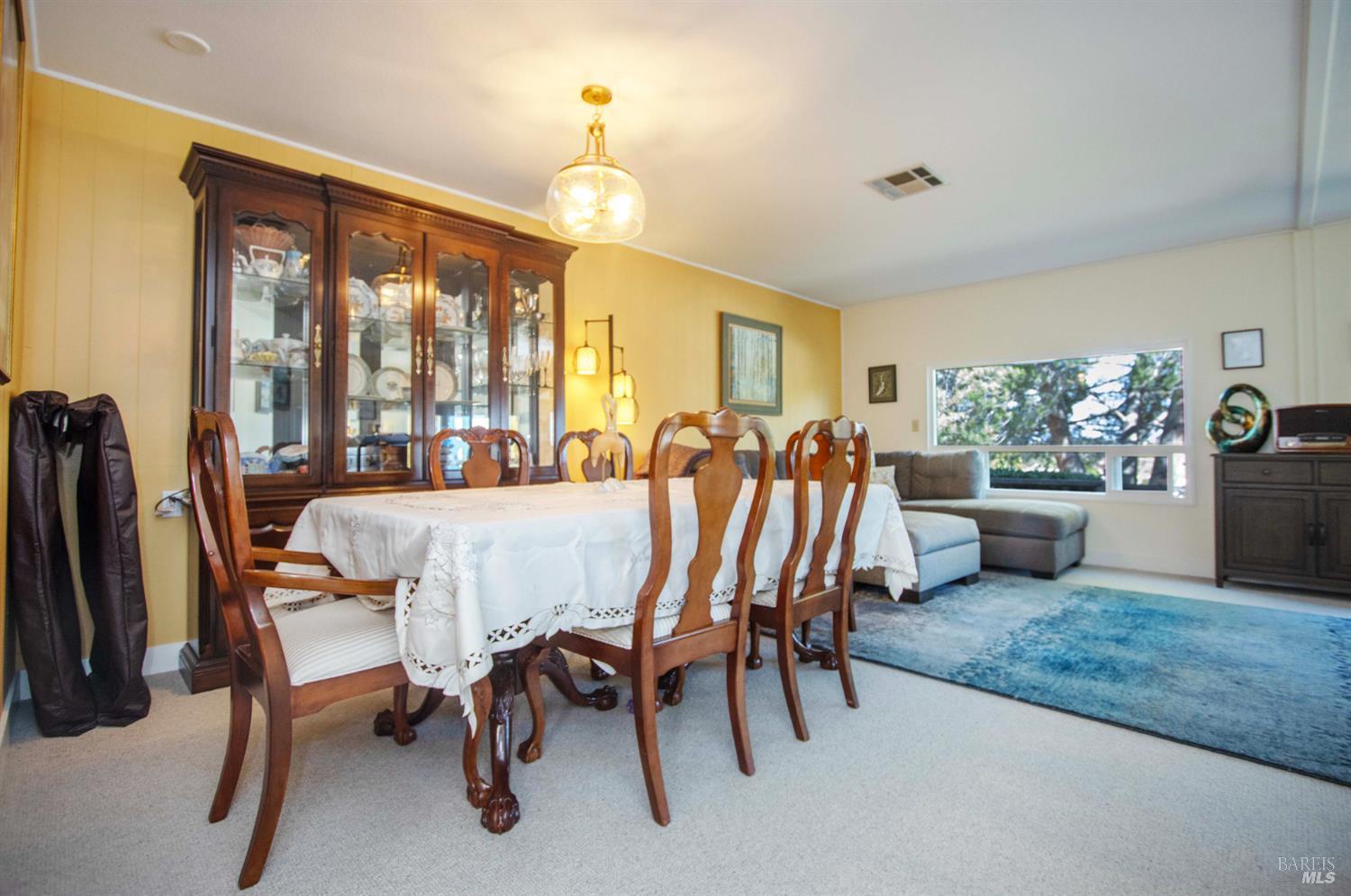 9 Fallen Leaf Way Novato, CA 94949 - Photo 6 of 32 a view of a dining room with furniture window and outside view