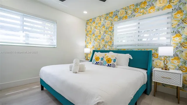 a front view of a house with a large window