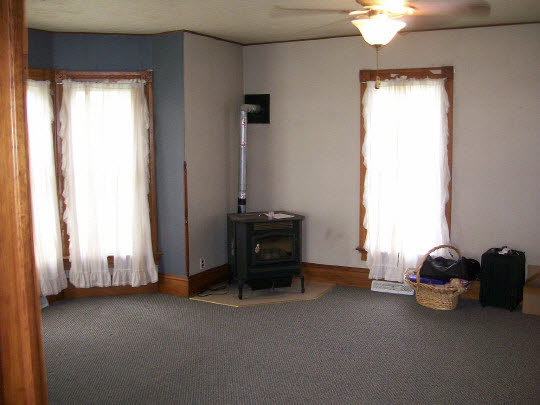 8802 West Haldane Road Polo, IL 61064 - Photo 7 of 9 a room with a window and a chair