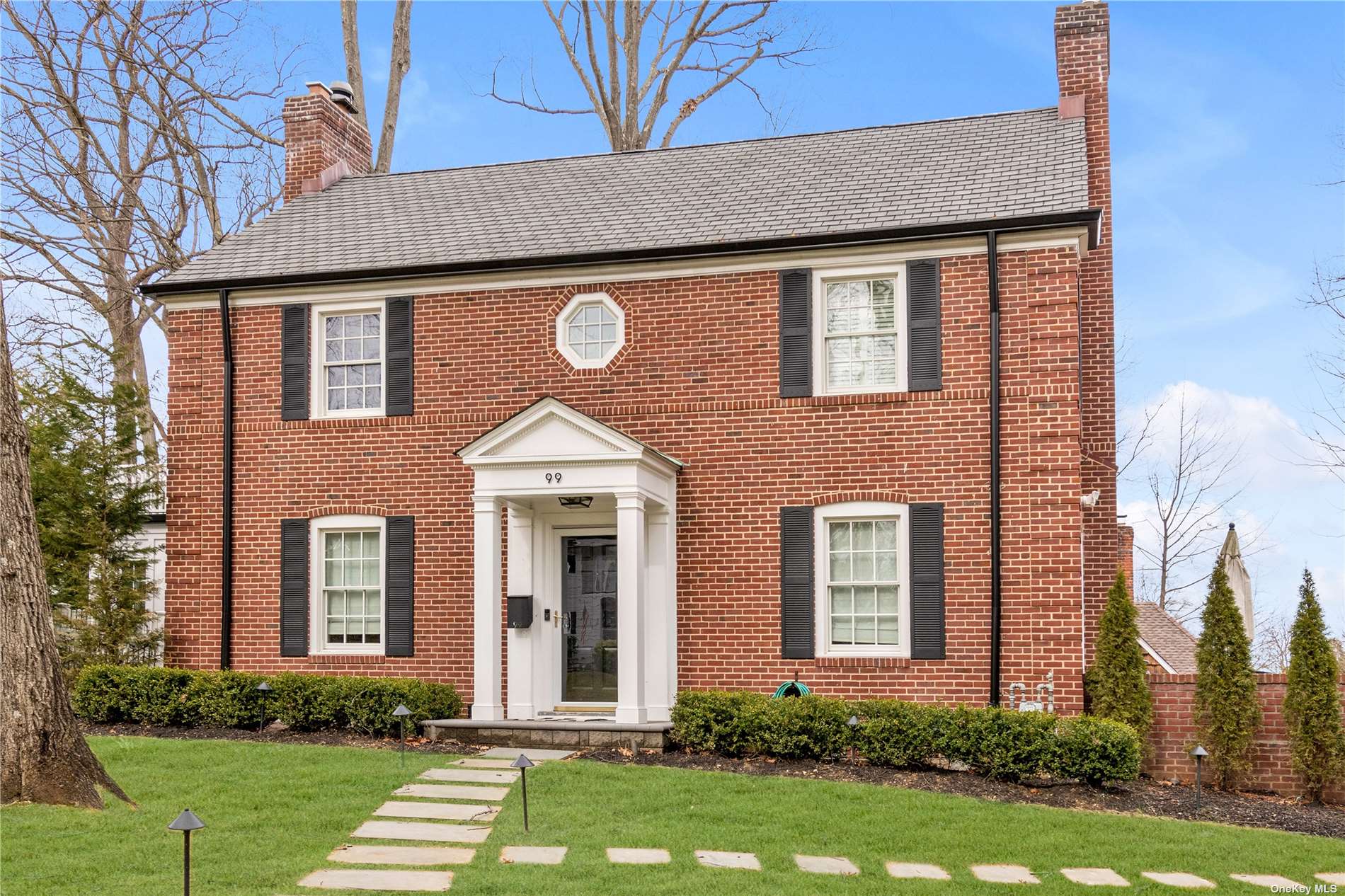 99 Longview Road Port Washington, NY 11050 - Photo 1 of 1 front view of a house