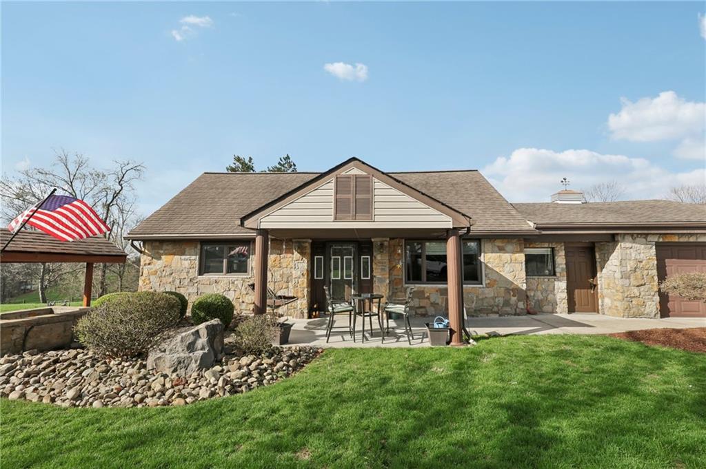 378 Mingo Church Road Finleyville, PA 15332 - Photo 1 of 48 a front view of a house with a garden and plants