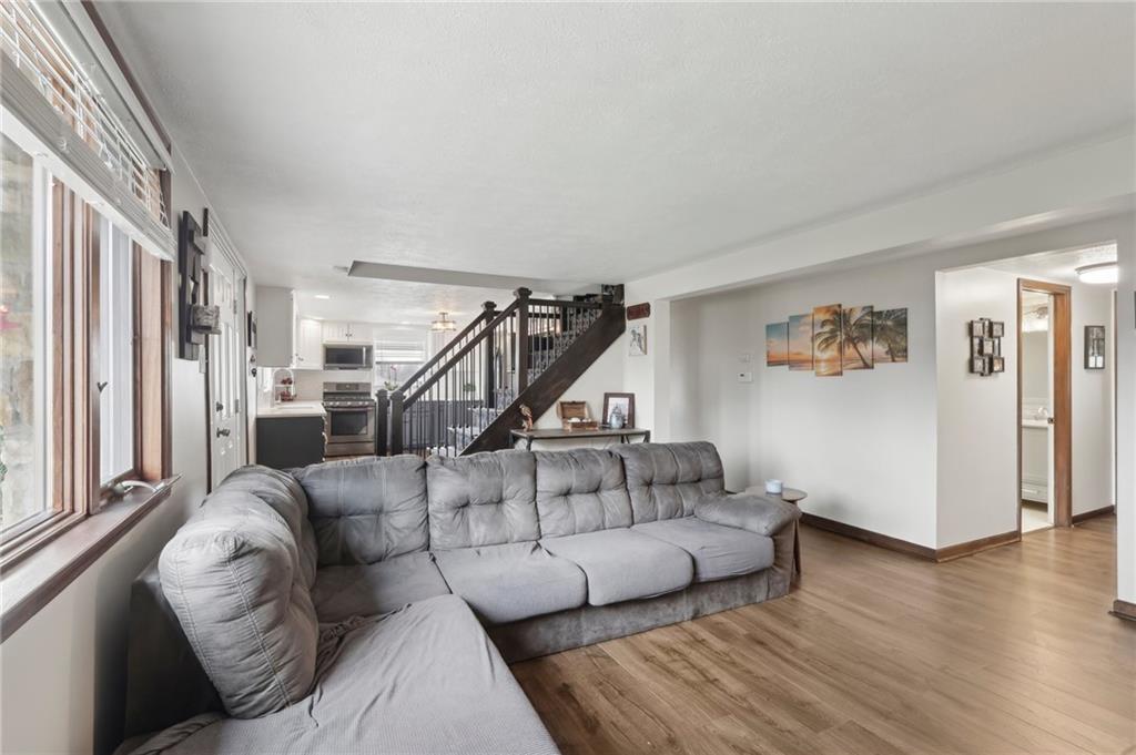 378 Mingo Church Road Finleyville, PA 15332 - Photo 11 of 48 a living room with furniture and wooden floor