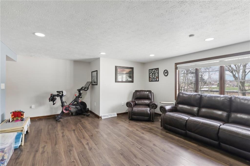 378 Mingo Church Road Finleyville, PA 15332 - Photo 13 of 48 a living room with furniture and a wooden floor