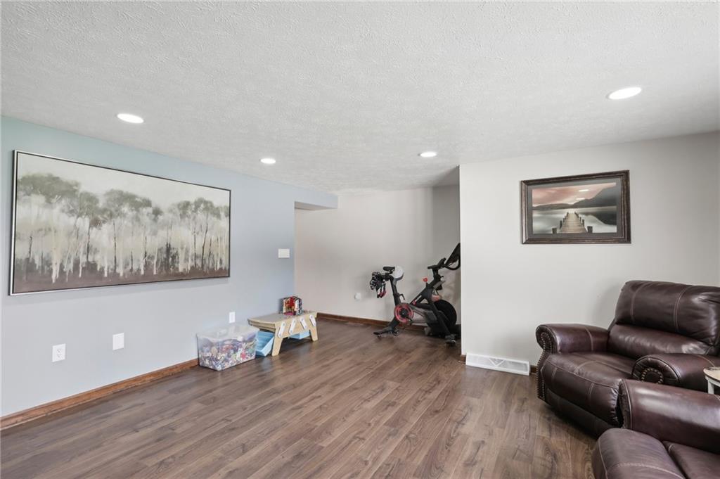 378 Mingo Church Road Finleyville, PA 15332 - Photo 14 of 48 a living room with furniture and a wooden floor