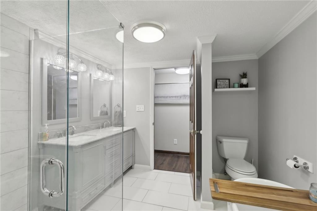 378 Mingo Church Road Finleyville, PA 15332 - Photo 24 of 48 a bathroom with a shower and a toilet