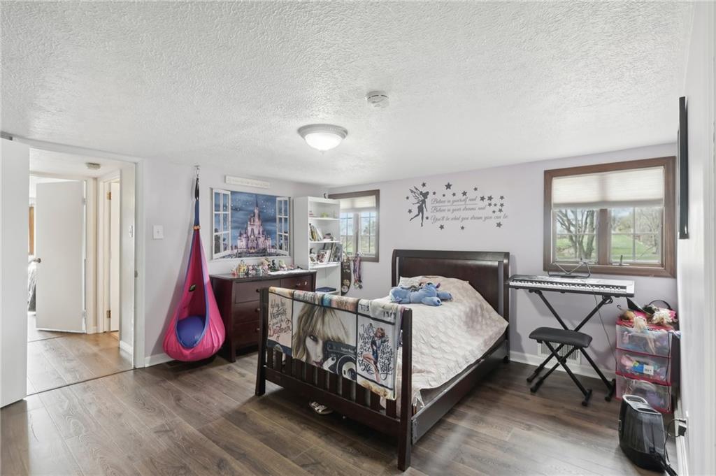 378 Mingo Church Road Finleyville, PA 15332 - Photo 30 of 48 a bedroom with bed and windows