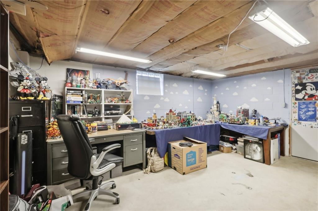 378 Mingo Church Road Finleyville, PA 15332 - Photo 37 of 48 a view of a room with workspace and a window