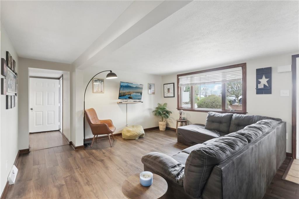 378 Mingo Church Road Finleyville, PA 15332 - Photo 8 of 48 a living room with furniture and a large window