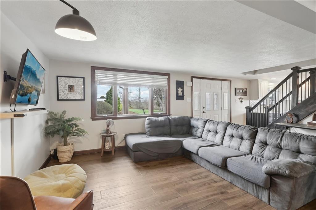 378 Mingo Church Road Finleyville, PA 15332 - Photo 10 of 48 a living room with furniture and a large window