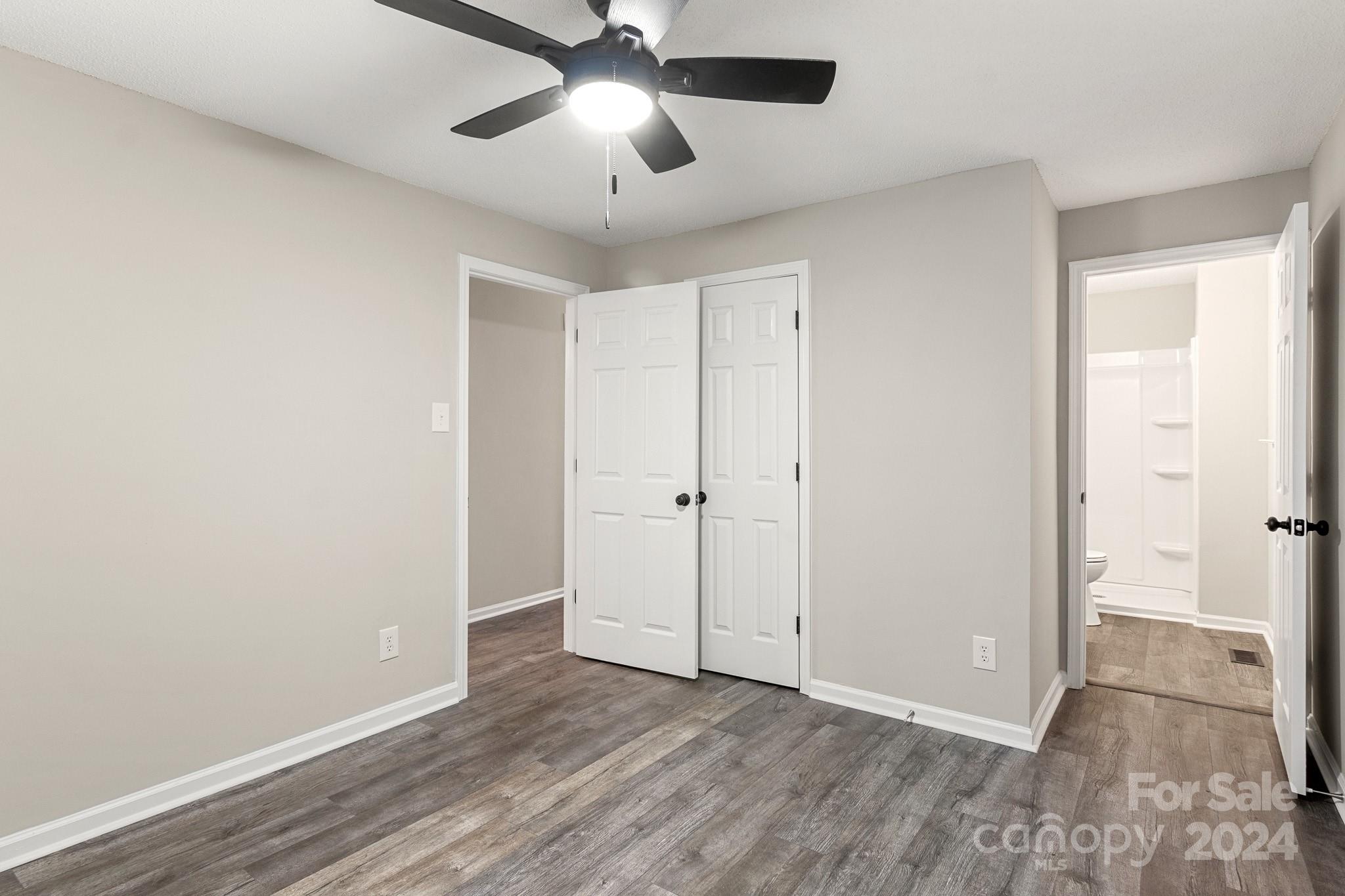 1602 Crowder Road Monroe, NC 28112 - Photo 23 of 34 a view of an empty room and wooden floor
