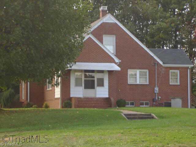 Exterior Front. 1092 Norman Road - Traditional Farmhouse with acreage and outbuildings