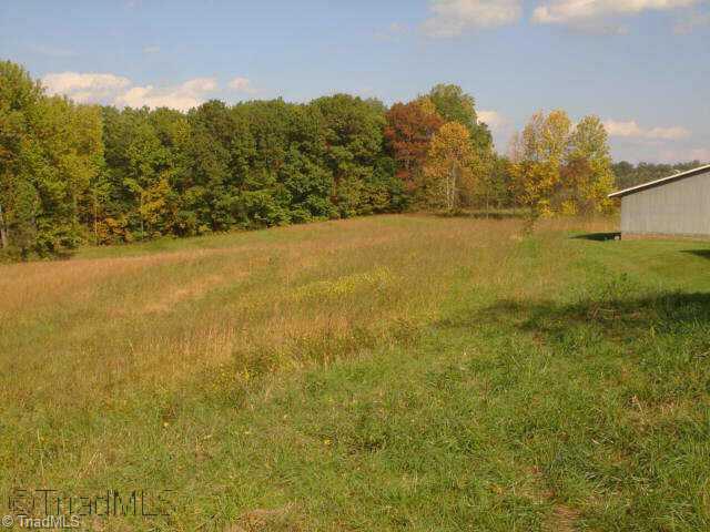 Other. Large open field behind outbuildings