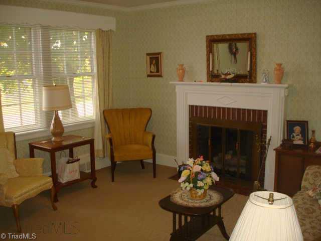 Other. Living room with Brick Fireplace and Gas Logs