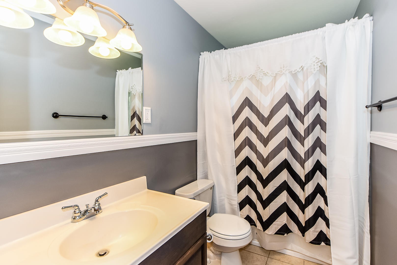 3012 Lafayette Road Knoxville, TN 37921 - Photo 5 of 11 a bathroom with a sink and a mirror