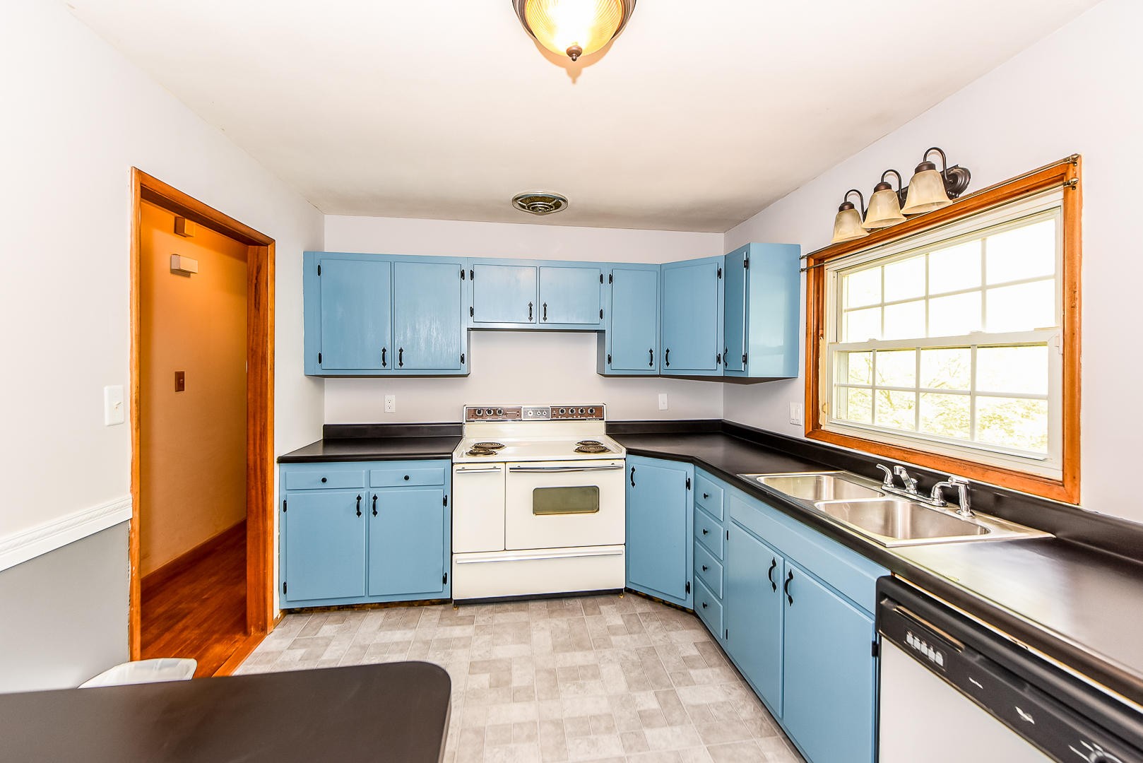 3012 Lafayette Road Knoxville, TN 37921 - Photo 6 of 11 a kitchen with stainless steel appliances granite countertop a sink and a stove