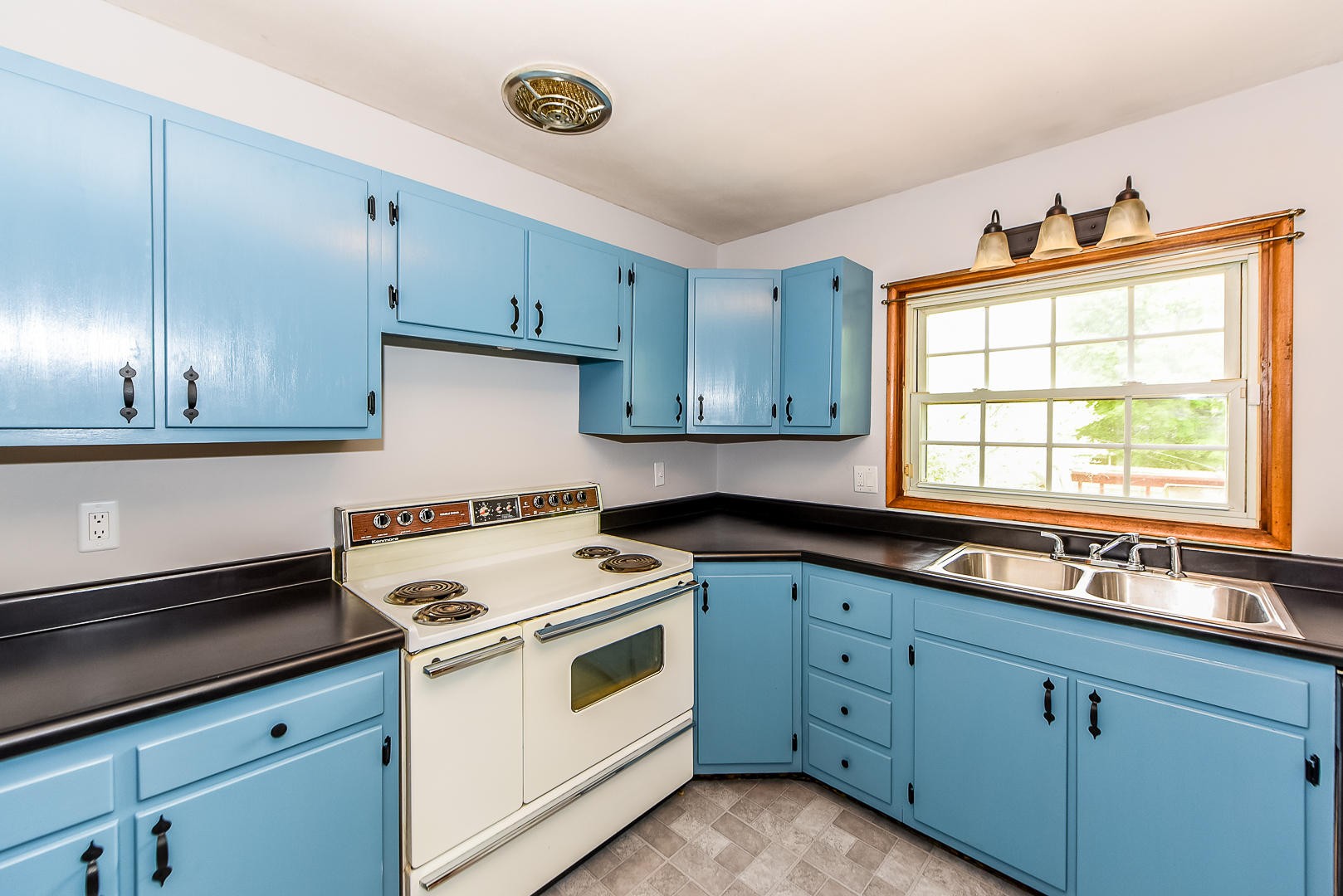 3012 Lafayette Road Knoxville, TN 37921 - Photo 7 of 11 a kitchen with appliances cabinets and a sink
