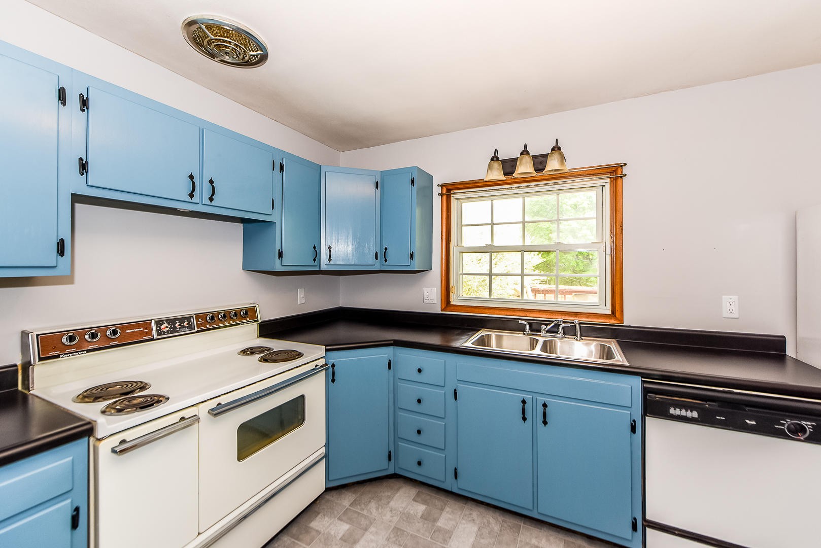 3012 Lafayette Road Knoxville, TN 37921 - Photo 8 of 11 a kitchen with appliances cabinets and a window