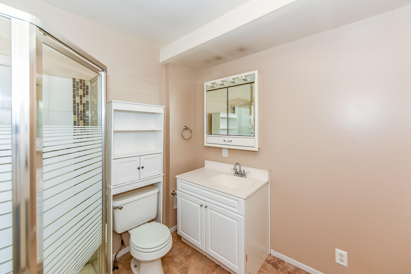 3012 Lafayette Road Knoxville, TN 37921 - Photo 9 of 11 a bathroom with a toilet a sink and mirror