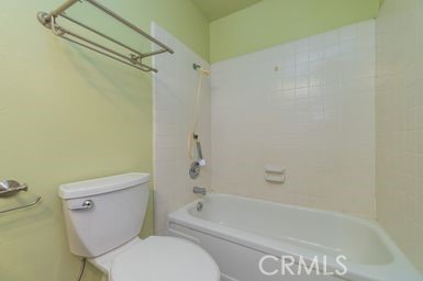 14 Featherwood Irvine, CA 92612 - Photo 23 of 32 a bathroom with a toilet and a bathtub