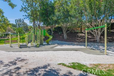 14 Featherwood Irvine, CA 92612 - Photo 31 of 32 a backyard of a house with plants and trees