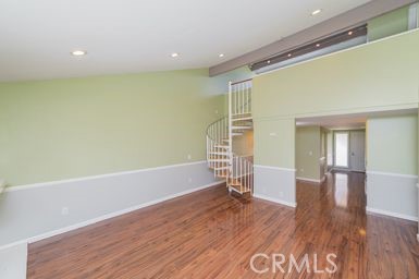 14 Featherwood Irvine, CA 92612 - Photo 9 of 32 a view of empty room with wooden floor