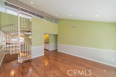 14 Featherwood Irvine, CA 92612 - Photo 10 of 32 a view of a hallway with wooden floor