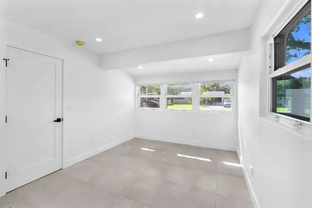 an empty room with windows