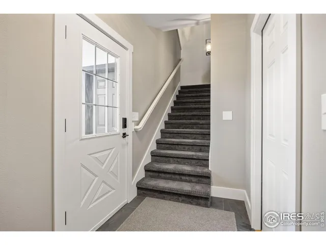 a view of entryway with wooden floor