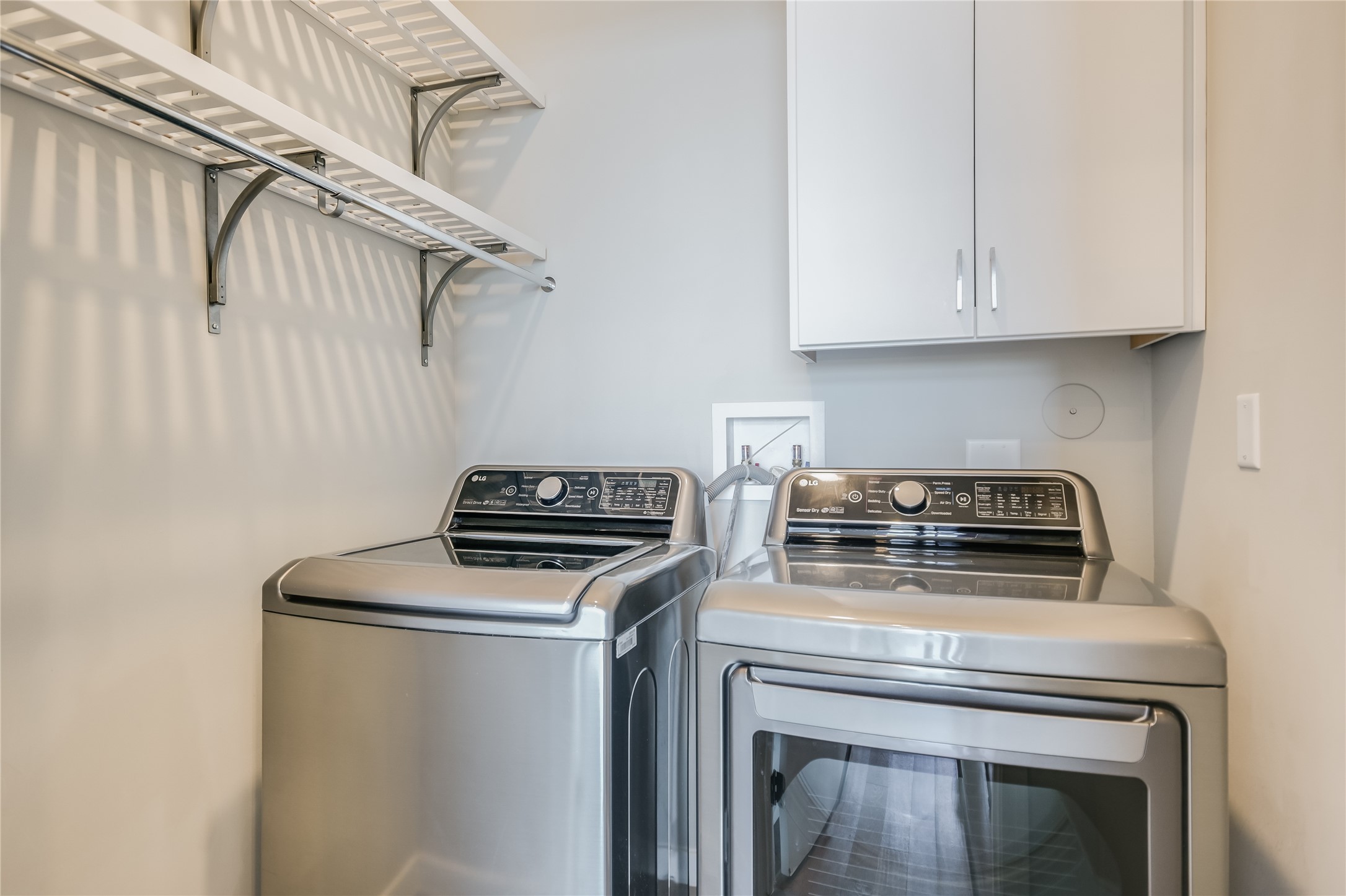 5921 Hiline Road, Unit 1501 Austin, TX 78734 - Photo 23 of 38 a stove top oven sitting inside of a kitchen