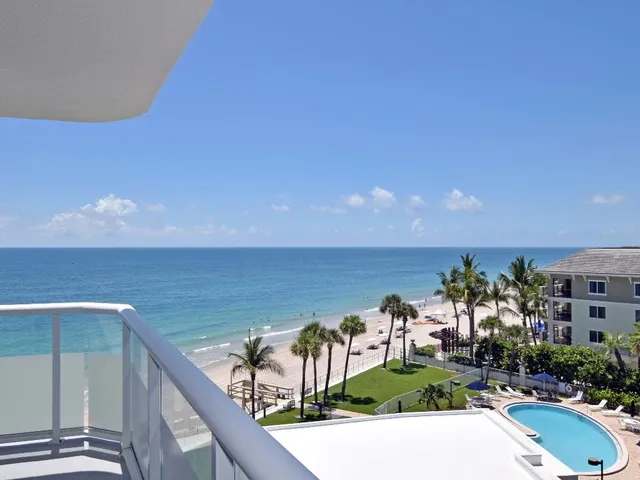a view of swimming pool from a balcony