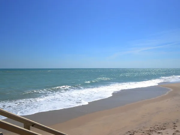 a view of beach and ocean