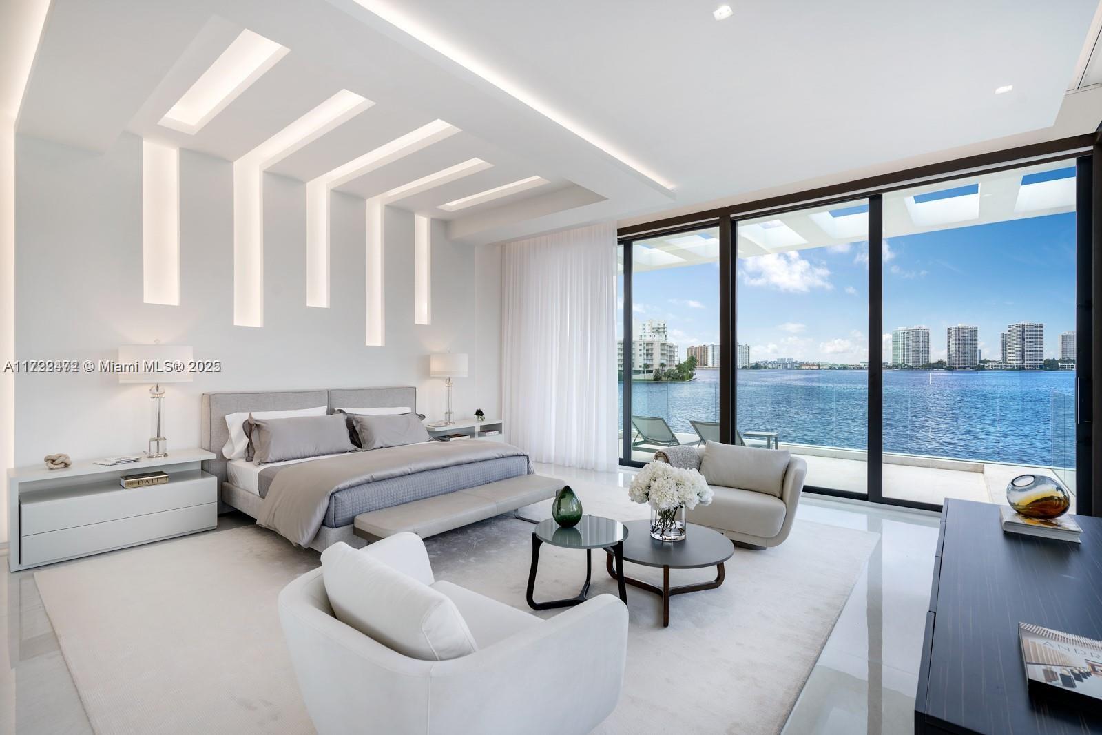 18530 North Bay Road Sunny Isles Beach, FL 33160 - Photo 6 of 10 a living room with furniture and floor to ceiling window