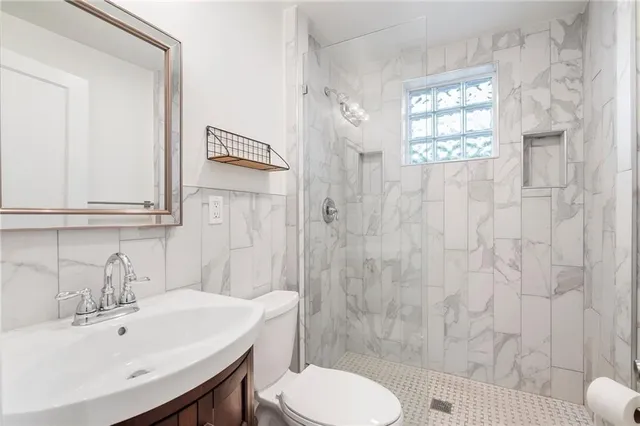 a view of a fountain in front of a house