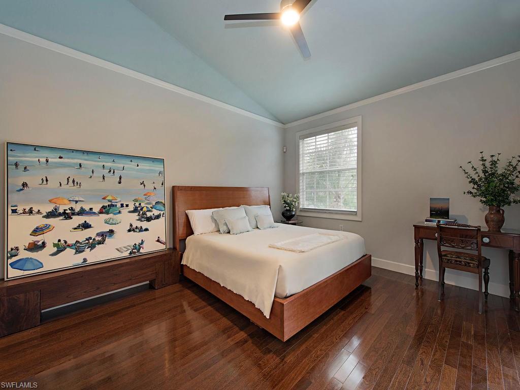 7120 Timberland Circle, Unit 202 Naples, FL 34109 - Photo 4 of 12 a bedroom with a bed and a window