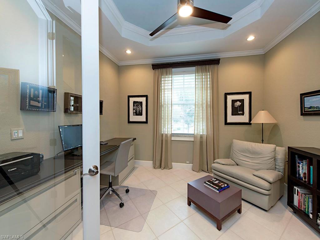 7120 Timberland Circle, Unit 202 Naples, FL 34109 - Photo 7 of 12 a living room with furniture and a window