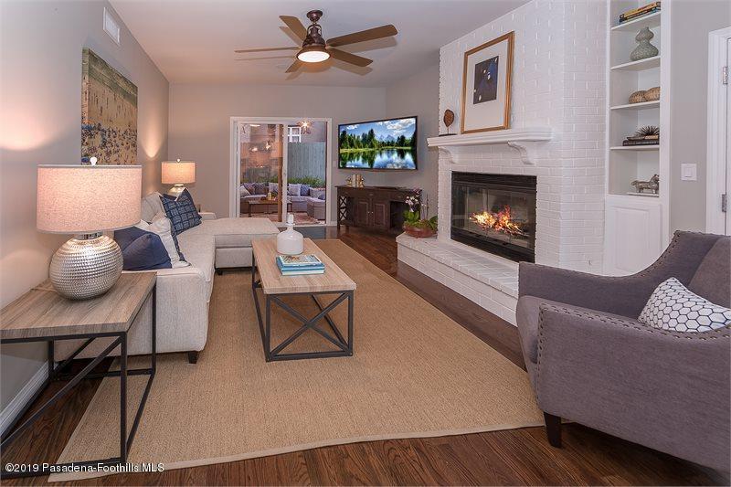 45 Club Road Pasadena, CA 91105 - Photo 15 of 36 a living room with furniture and a fireplace