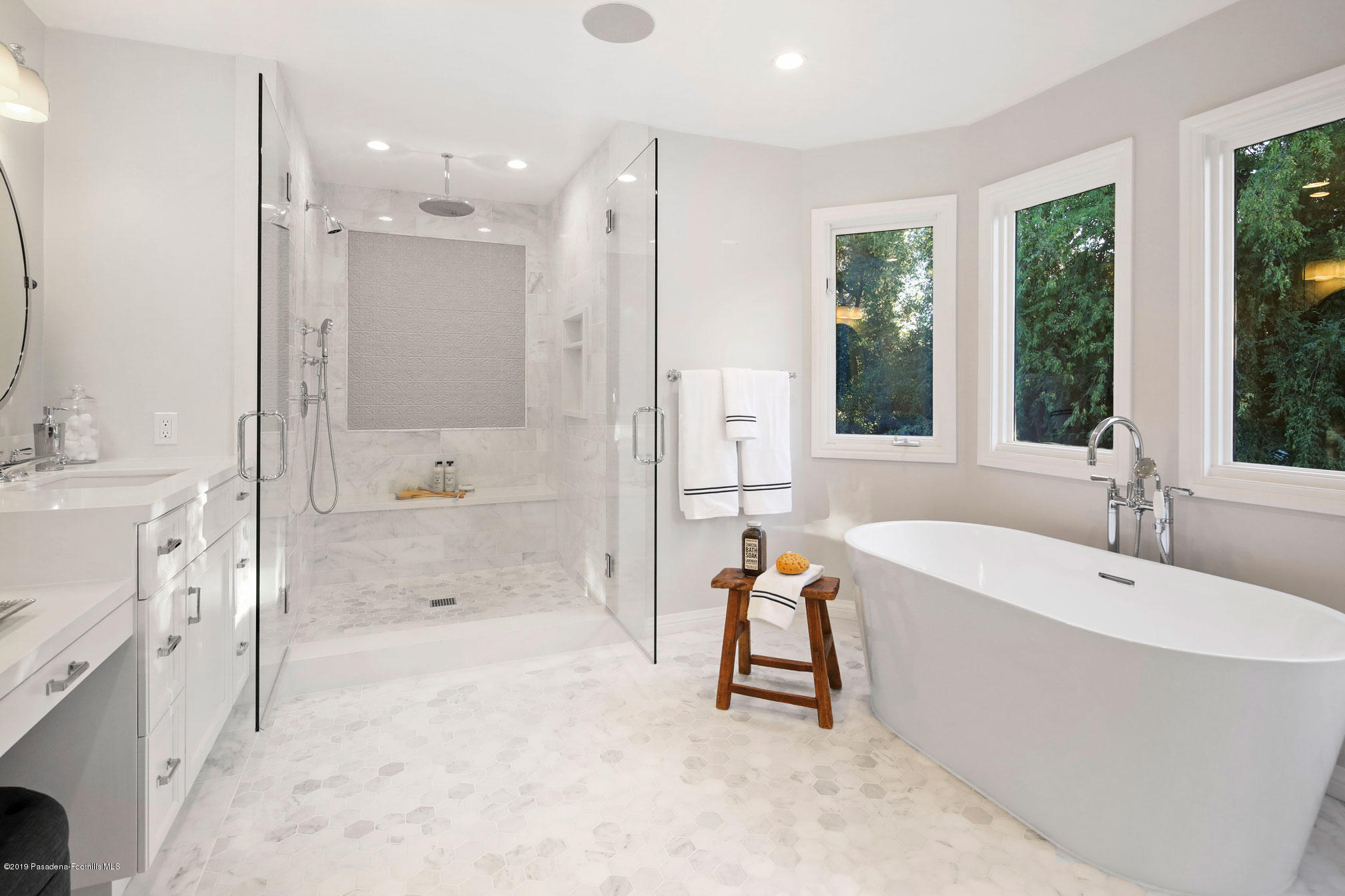 45 Club Road Pasadena, CA 91105 - Photo 23 of 36 a bathroom with a tub sink double vanity and a shower