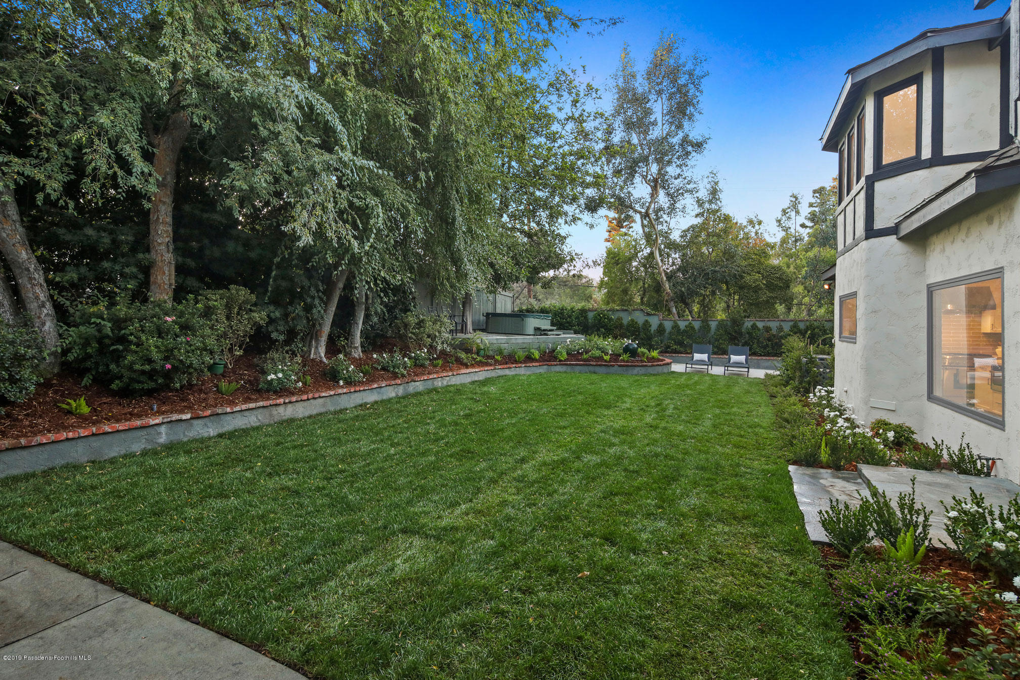 45 Club Road Pasadena, CA 91105 - Photo 34 of 36 a view of a garden with a house in the background